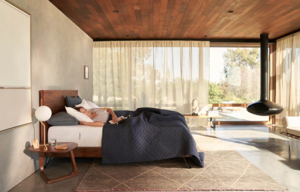 Woman sleeping on a Casper mattress in her home