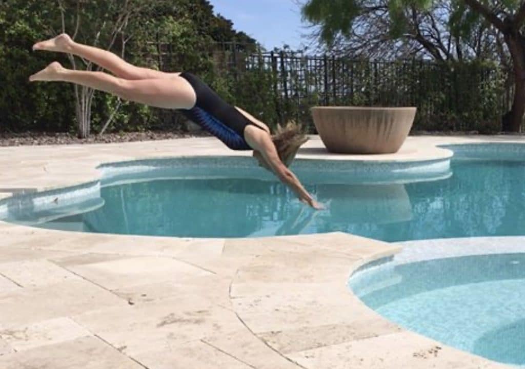 Pam Eichner diving into the pool