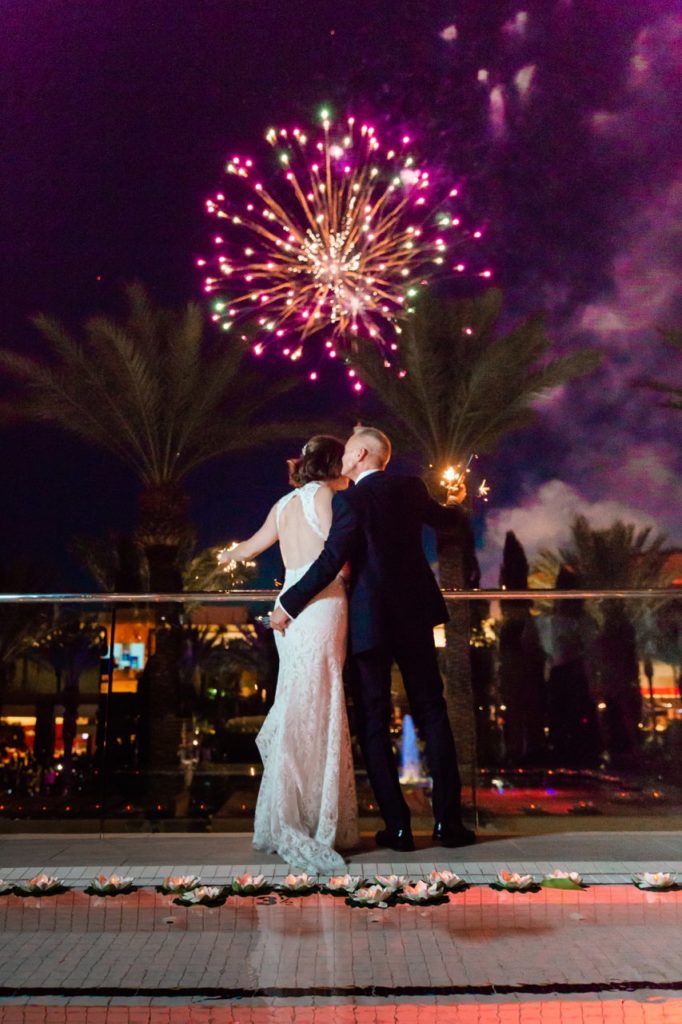 Wedding with fireworks in background at Red Rock