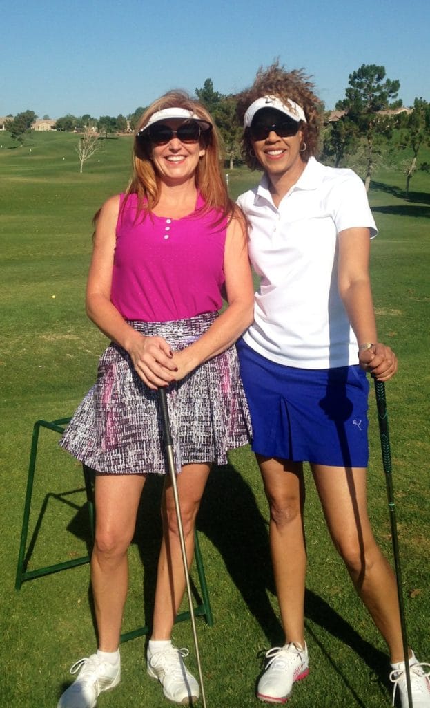 Susan Dow and Adrienne O’Neal golfing