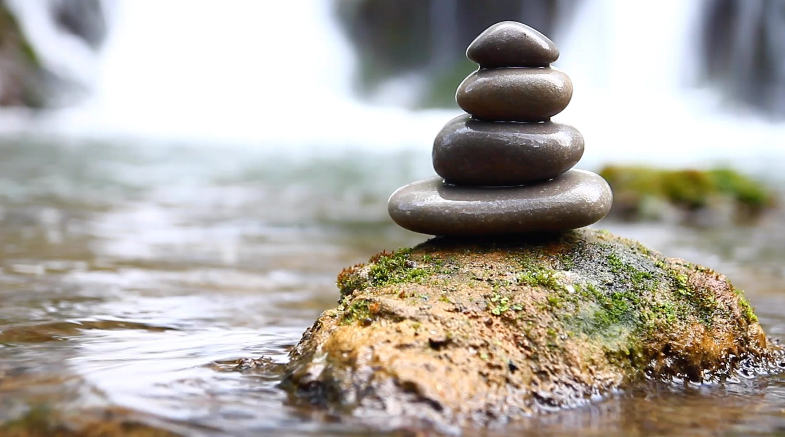 Stacked rocks on a river