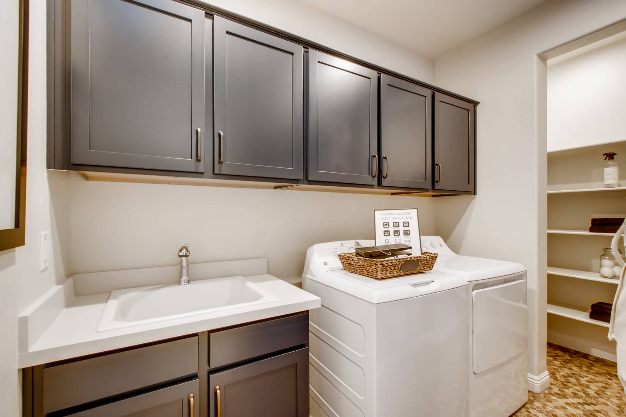 Laundry Room of Sierra Plan at Crystal Canyon by Woodside Homes