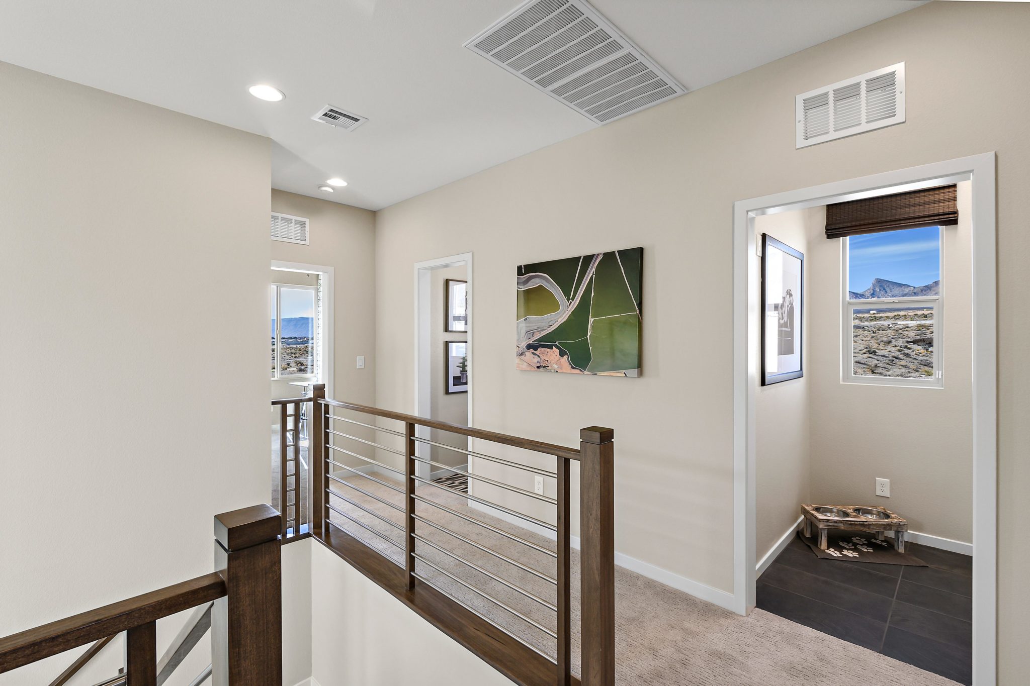 Upstairs Stairwell in Acacia Model at Crested Canyon s by Taylor Morrison in Summerlin