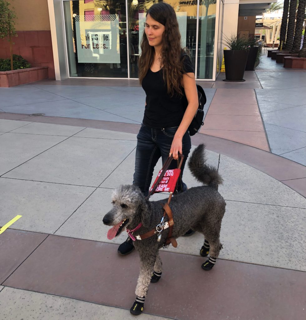 Skye Dunfield and her dog Cindi walking