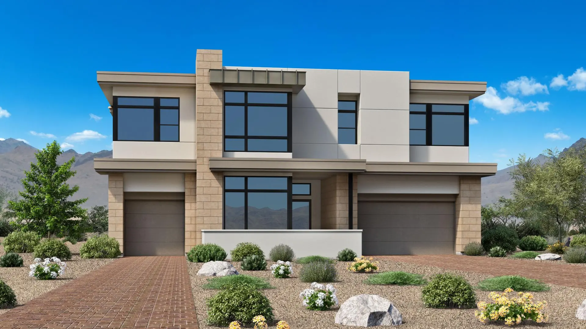SMHL_MOD_NVS_3SPE_8034_1_1920 Modern two-story house with large windows, flat roof, and beige stone accents. The front yard features desert landscaping with rocks, gravel, shrubs, and small flowering plants under a clear blue sky.
