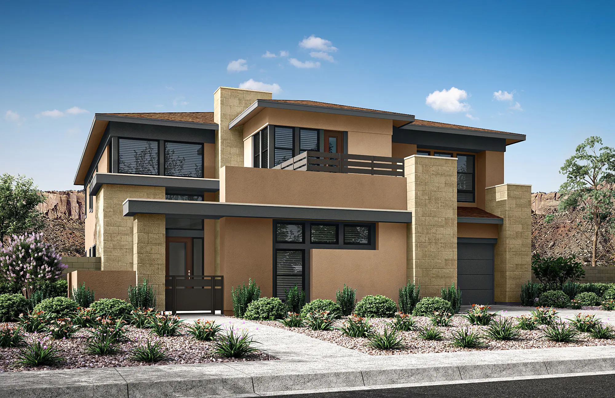 08_TP-LV-Carlisle-Peak_HT-Plan-3B_CS-08 Modern two-story house with flat roofs, large windows, tan and brown exterior, stone accents, balcony, and a landscaped front yard with desert plants—Plan 3 at Carlisle Peak by Tri Pointe Homes—set against a clear blue sky and rocky background.