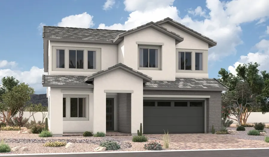 TetonLA55_C_Gen3_elev_IND_07_17_25 A modern two-story house featuring the Teton Floorplan at Primrose Park by Richmond American Homes with light-colored exterior walls, grey roof shingles, large windows, an attached two-car garage, and desert landscaping with rocks and drought-tolerant plants.