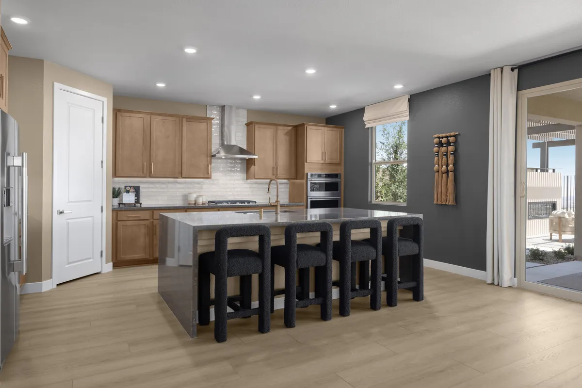 Kitchen of Plan 3095 at Cloudbreak Ridge by KB Home