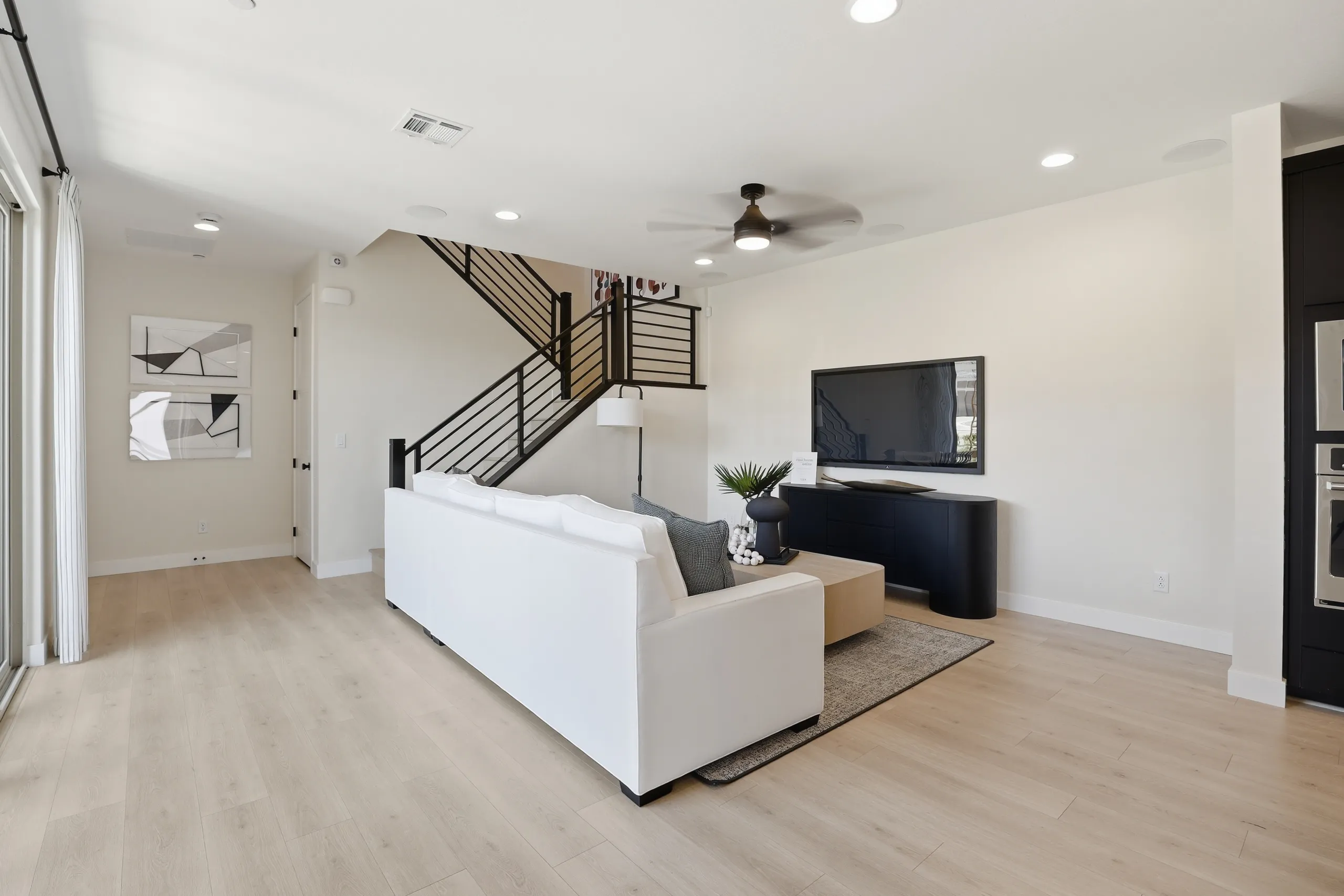 Living Room of Nina 3 Model at Iris Glen by Richmond American Homes