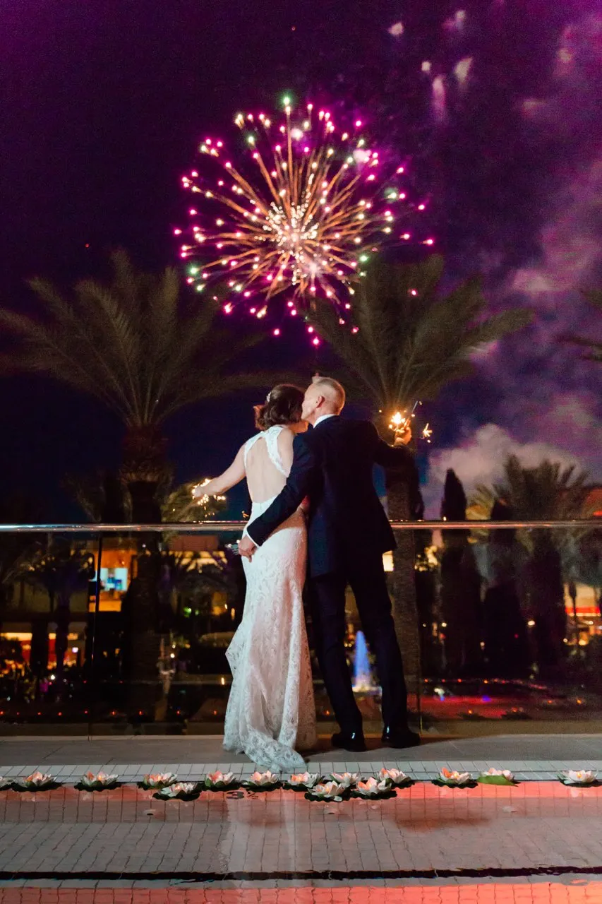 Wedding with fireworks in background at Red Rock