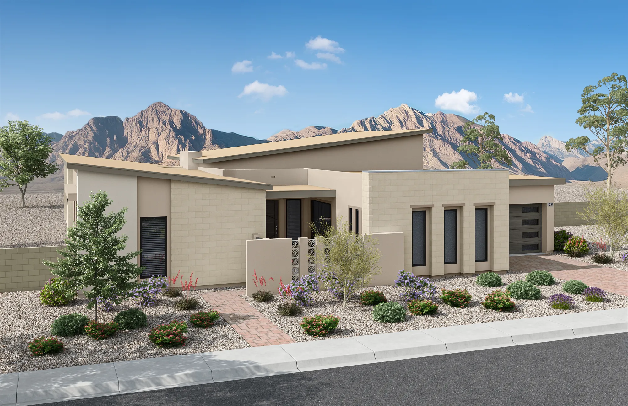 Front Elevation C of Plan 4 at Agave Ridge by Tri Pointe Homes Modern beige house with flat roofs, large windows, and desert landscaping in front. Mountains and a clear blue sky are visible in the background. Shrubs and small trees line the walkway and drive.